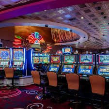Mobile phone displaying gajian123 login app with live dealer table
